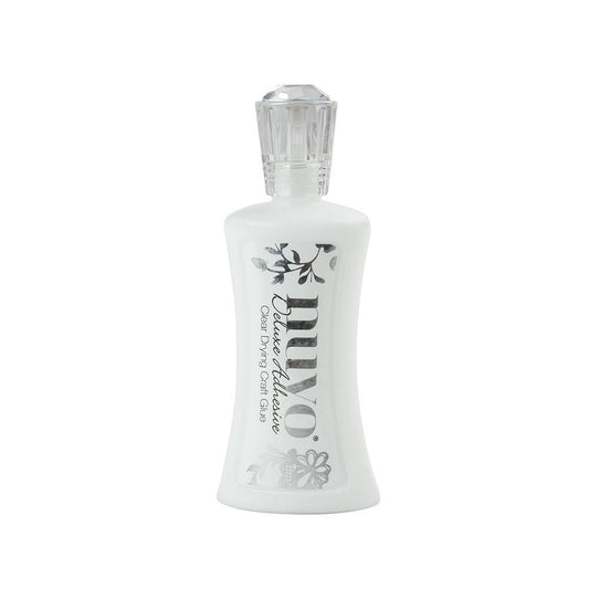 Nuvo Deluxe Adhesive